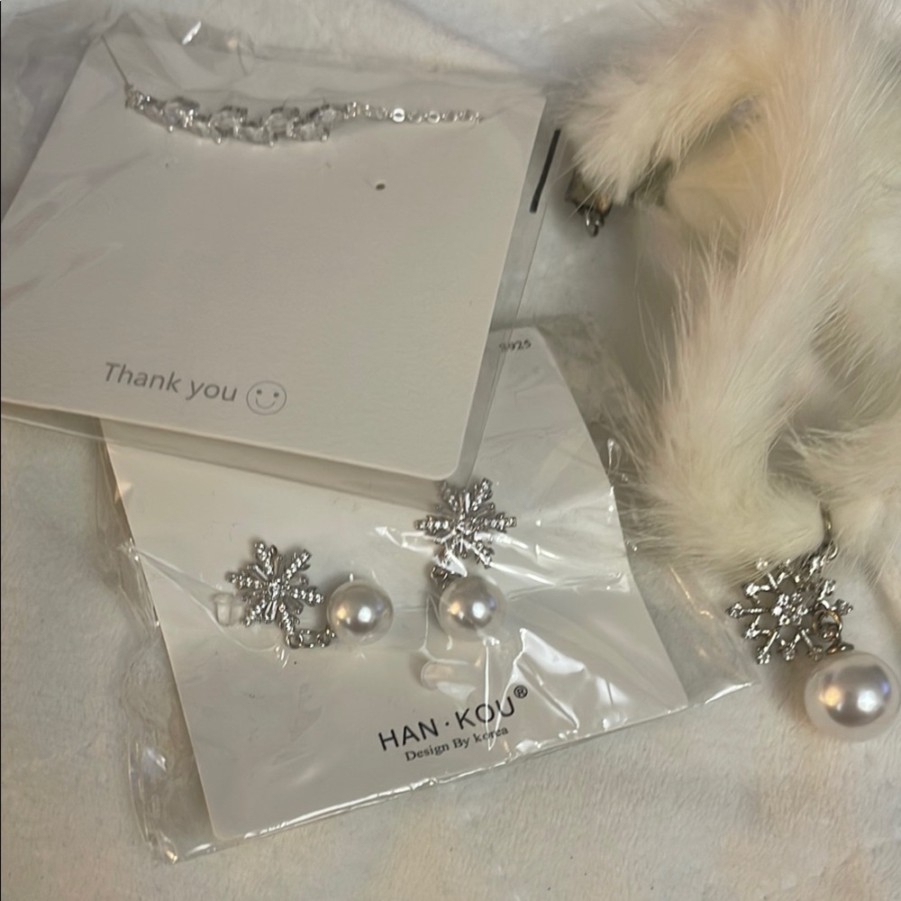Faux Fur Necklace with Snowflake Pendant earrings and necklace.
